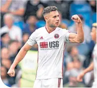  ??  ?? United’s George Baldock celebrates at 90 minutes