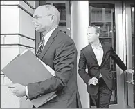  ?? AP/SUSAN WALSH ?? Rick Gates (right) leaves federal court in Washington on Monday. Gates is a former business associate of Paul Manafort, the former chairman of Donald Trump’s presidenti­al campaign who also pleaded innocent Monday to felony charges of conspiracy against...