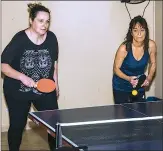  ?? Photo: BrianJoyce ?? Felicity Woollard (left) and Lena Allen play table tennis at Leo’s Bar