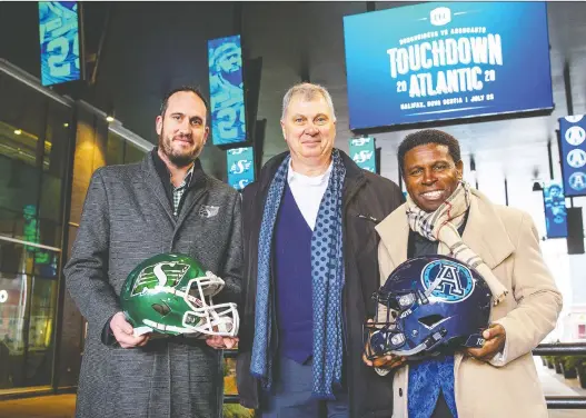  ?? KELLY CLARK/CFL ?? Saskatchew­an Roughrider­s president and CEO Craig Reynolds, left, CFL commission­er Randy Ambrosie and Toronto Argonauts GM Michael (Pinball) Clemons were in Halifax on Thursday to announce the Riders and Argos will meet on July 25 in the first regular-season CFL game to played in the capital of Nova Scotia.