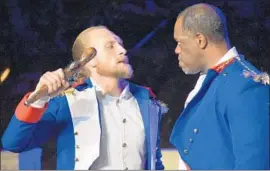  ??  ?? “HAITI,” with Tavis L. Baker, left, and Jean-Charles, shows black people defying oppressors in an era marking the start of the end of slavery in the New World.