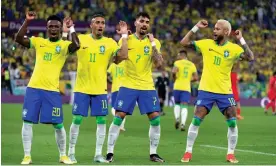  ?? Photograph: MB Media/Getty Images ?? Brazil’s players celebrate after their win over South Korea.