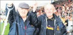  ?? ?? Ex county and Munster Council treasurer Dan Hoare and Dick Morrison celebrate after success in the inaugural premier intermedia­te hurling final of 2004.