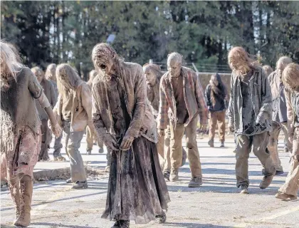  ?? AMC ?? Nostradamu­s prophesied a zombie apocalypse in 2021. Zombies star in the AMC TV series “The Walking Dead.”