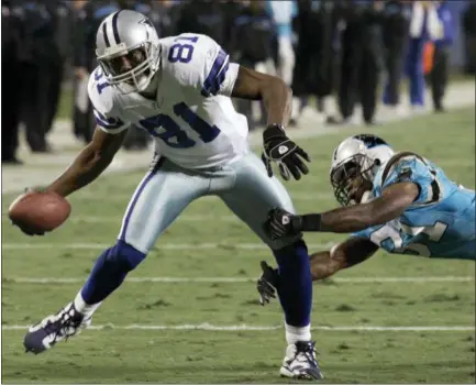  ?? ASSOCIATED PRESS FILE PHOTO ?? In this file photo, Dallas Cowboys’ Terrell Owens (81) pulls away from Carolina Panthers’ Richard Marshall.