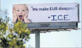  ?? AFP ?? ▪ A vandalised billboard shows a message in protest against the Immigratio­n and Customs Enforcemen­t (ICE) and its participat­ion in separating children from their parents trying to enter the US.