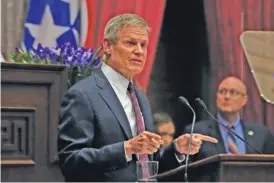  ?? AP PHOTO/GEORGE WALKER IV ?? Gov. Bill Lee delivers his State of the State address in the House chamber Feb. 5 in Nashville. Lee on Monday signed a bill restrictin­g banks from denying service to clients for religious, environmen­tal or social reasons.