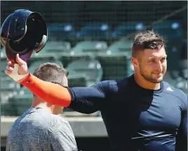  ?? AP PHOTO ?? Tim Tebow is batting .231 with the Columbia Fireflies, the Class A South Atlantic League affiliate of the New York Mets.