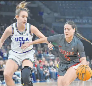  ?? David Becker The Associated Press ?? Washington State guard Charlisse Leger-walker is one of five internatio­nal players that make up the Cougars’ starting lineup.