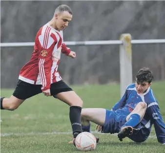  ??  ?? Sunderland West End (red) line up a shot against Wolviston on Saturday. Pictures by Tim Richardson