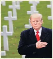  ??  ?? BETTER LATE... Donald Trump at cemetery