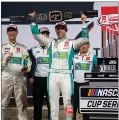  ?? (AP/Mike Caudill) ?? Denny Hamlin celebrates Sunday after winning a NASCAR Cup Series race at Richmond Raceway, in Richmond, Va. Hamlin, who had previously been more inclined to blame the over-the-wall guys for costing him wins, praised his pit crew for the final stop.