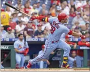  ?? LAURENCE KESTERSON – THE ASSOCIATED PRESS ?? Nolan Arenado hits the first of four consecutiv­e first-inning homers by the Cardinals against the Phillies on Saturday.