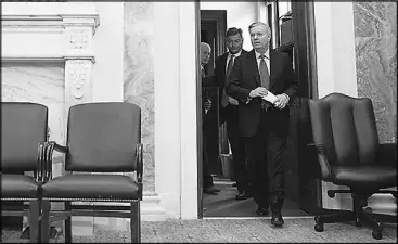  ?? TOM BRENNER / THE NEW YORK TIMES ?? Sen. Lindsey Graham, R-S.C., arrives Sept. 13 at a news conference on health care. Behind him are Sens. Dean Heller, R-Nev., and Ron Johnson, R-Wis. Heller supports Graham’s bill, which would take Medicaid funds under the Affordable Care Act and give...