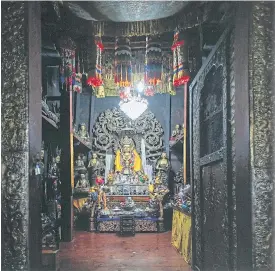  ??  ?? View of the sacred Jowo altar from the entrance to the inner sanctum of Jowo Lhakhang.