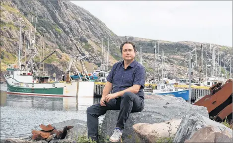  ?? CP PHOTO ?? Mark Critch poses for a portrait on the south side of the harbour in St. John’s earlier this summer.