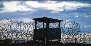  ?? DOUG MILLS/THE NEW YORK TIMES ?? A sentry tower at Camp X-ray, the original prison facility for detainees at Guantanamo Bay. In time, the United States would hold about 780 prisoners at the remote outpost, most of them on suspicion of terrorism. Only 39 remain incarcerat­ed today.