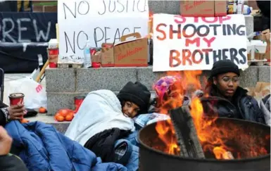  ?? CHRISTOPHE­R REYNOLDS/TORONTO STAR FILE PHOTO ?? The protesters heard the decision last week by the Special Investigat­ions Unit not to criminally charge the officer who killed Andrew Loku, and have responded with outrage and resolve against police headquarte­rs, writes Desmond Cole.