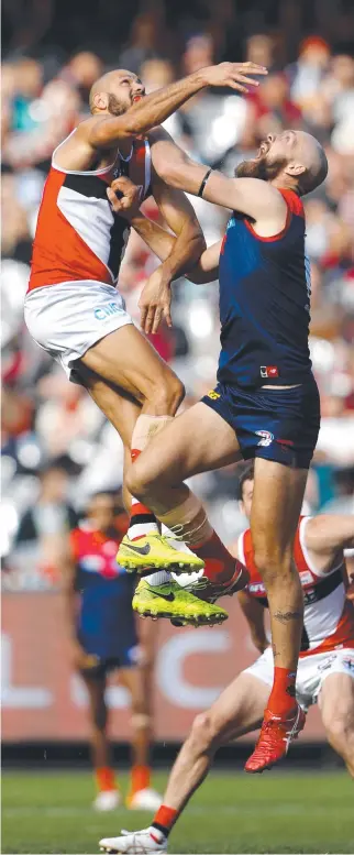  ?? ?? Paddy Ryder and Max Gawn in the ruck last weekend. Gawn was injured in the clash.