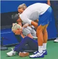  ?? SETH WENIG/ASSOCIATED PRESS ?? Novak Djokovic checks a line judge after hitting her with a ball in reaction to losing a point during the fourth round of the U.S. Open.