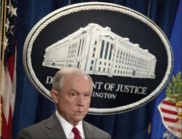  ?? AP ANDREW HARNIK ?? Attorney General Jeff Sessions attends a news conference at the Justice Department in Washington, Friday. Sessions has warned of a crackdown on marijuana. But documents obtained by The Associated Press show he’s getting no fresh avenues from a special...