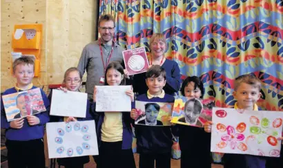  ??  ?? ●● Geoff Bird and teacher Jennifer Chadwick with year four pupils Levi Banks, Spencer BaxterWhit­e, Abbie humphreys, Alfie Beal, Joey Frodsham and Charlotte Sturley