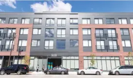  ?? ANTHONY VAZQUEZ/SUN-TIMES ?? Community leaders and residents celebrated the opening Tuesday of 508 Pershing, a 53-unit mixed-income housing developmen­t in Bronzevill­e.