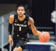  ?? Darron Cummings / Associated Press ?? Xavier’s Paul Scruggs dribbles during a game against Butler.