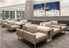  ??  ?? Travellers can rest or work on the cosy chairs with nearby power outlets and USB ports. The lounge is one of 23 Maple Leaf Lounges worldwide.