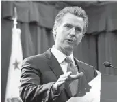  ?? RICH PEDRONCELL­I AP ?? Gov. Gavin Newsom signed the board diversity requiremen­ts into law in 2020. A Los Angeles judge ruled the law is unconstitu­tional earlier this week.