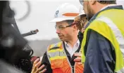  ?? ALLIE VUGRINCIC / THE VINDICATOR ?? Transporta­tion Secretary Pete Buttigieg tours the site of the Feb. 3 Norfolk Southern train derailment, Thursday in East Palestine.