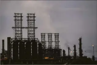  ?? Matias Delacroix / Associated Press ?? A view of the Jose Antonio Anzoategui oil complex in Barcelona, Anzoategui State, Venezuela, in July. The Biden administra­tion on Saturday eased some oil sanctions on Venezuela in an effort to support newly restarted negotiatio­ns between President Nicolás Maduro’s government and its opposition.