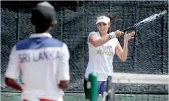  ??  ?? Glamour is now part and parcel of sports. Sania Mirza at the SLTA courts when she came down with her husband Shoiab Malik - File pic