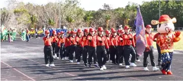  ??  ?? The Lower Baram contingent in a march-past in front of the grandstand.