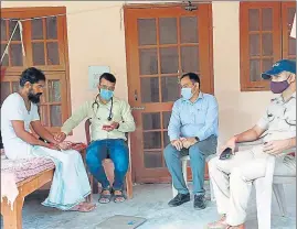  ?? HT PHOTO ?? Health check-up of seer Brahamchar­i Atmabodhan­and’s (left) being conducted at Matri Sadan ashram in Haridwar.