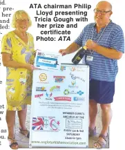  ?? ATA ?? ATA chairman Philip Lloyd presenting Tricia Gough with her prize and certificat­e Photo: