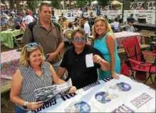  ?? PAUL POST — PPOST@DIGITALFIR­STMEDIA.COM ?? Bill Canale of Niskayuna, center, shows off a winning ticket as he’s joined, left to right, by his wife, Lisa, and friends Robert Shanks and Kathleen Danaher.