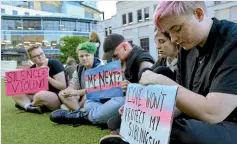  ?? PHOTOS: FELIX DESMARAIS ?? From left: Kate Aschoff, K Horne, Winter Kneale, Teri O’Neill and Daniel Stephens at the vigil for Zena Campbell held in Civic Square this week.