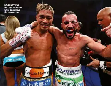  ?? Photo: MIKEY WILLIAMS/TOP RANK ?? BONDED BY WAR: Ito [left] celebrates while Diaz enjoys the moment too