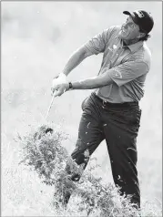  ?? ERIC CHRISTIAN SMITH / ASSOCIATED PRESS ?? Phil Mickelson, who’s a shot off the lead in the Houston Open, is pleased with his game: “I’ve driven it very well this week ... hit a lot of fairways. My short game has been sharp, too.”