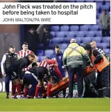  ?? JOHN WALTON/PA WIRE ?? John Fleck was treated on the pitch before being taken to hospital