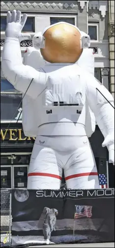  ??  ?? The giant inflatible astronaut has become an iconic symbol for the Summer Moon Festival, celebratin­g Wapakoneta's connection to Astronaut Neil Armstrong and the continuati­on of space exploratio­n.