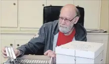  ?? RICHARD HUTTON METROLAND ?? Royal Canadian Legion Branch 124 president Al Howes sorts through boxes of cassette tapes that document the stories of local veterans.