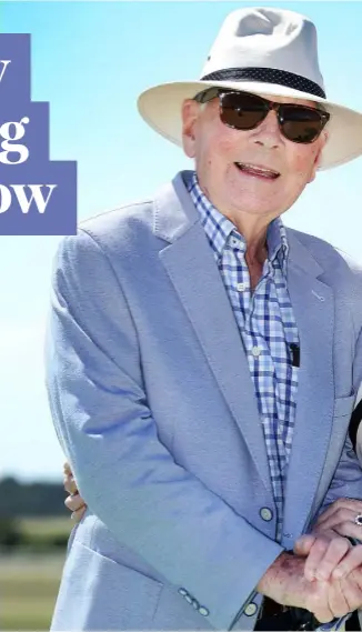  ??  ?? Gay Byrne and his wife Kathleen Watkins enjoying the Dubai Duty Free Irish Derby at