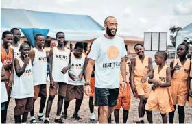  ??  ?? Moved: Nathan Redmond says there were stories from his visit to Ghana (left) that ‘will stick with me for a lifetime’, and (below) in action for Southampto­n