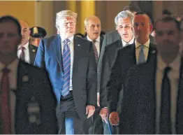  ?? Pablo Martinez Monsivais / Associated Press ?? President Donald Trump walks with House Majority Leader Kevin McCarthy of California as he leaves the Capitol after meeting with GOP leadership.
