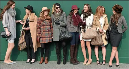  ??  ?? Some smart looks: Members of the UCD Racing Club yesterday, and, below, boutique owner Chanelle McCoy