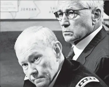  ?? CHIP SOMODEVILL­A/GETTY ?? Gen. Martin Dempsey, left, and Defense Secretary Chuck Hagel testify Tuesday before the Senate Armed Services Committee about U.S. plans to combat Islamic State militants.