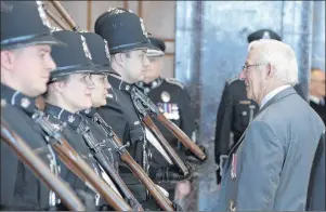  ?? THE CANADIAN PRESS/KEITH GOSSE ?? Newfoundla­nd and Labrador Lt.-Gov. Frank Fagan inspects the honour guard at Confederat­ion Building before reading the speech from the throne in the House of Assembly in St. John’s on Tuesday.