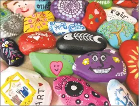 ??  ?? This year, the Durham Fair is taking part in a kindness rock project. Individual­s have painted stones with inspiratio­nal messages. Artists upload their creations to the Durham Fair Art Rocks! contest to win prizes.